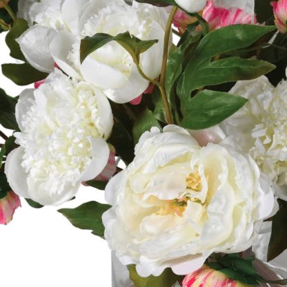 white Peony arrangement in a glass vase