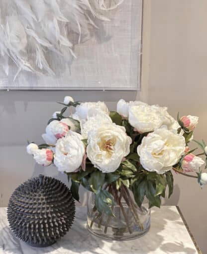 White peony arrangement in glass vase