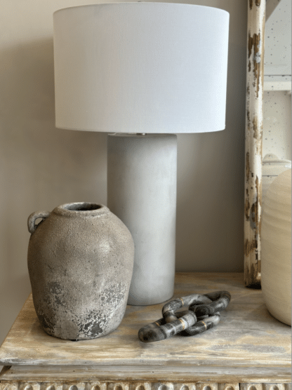 Grey Round Concrete-look Table Lamp base, with a round white cotton lamp shade