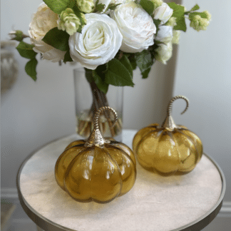 Round Amber glass decorative pumpkin with a gold stem