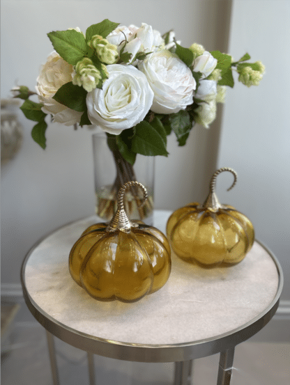 Round Amber glass decorative pumpkin with a gold stem