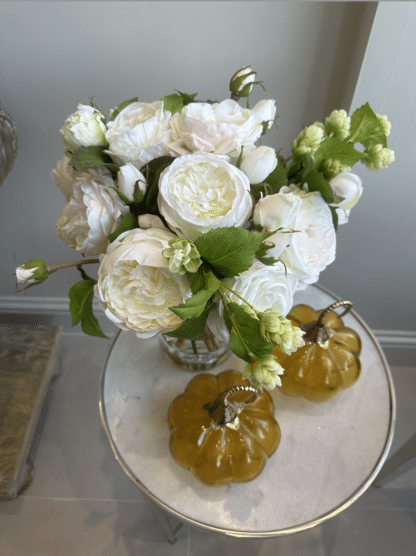 Round Amber glass decorative pumpkin with a gold stem