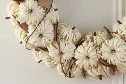 Ivory round pumpkin wreath with straw detail