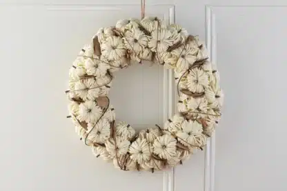 Ivory round pumpkin wreath with straw detail